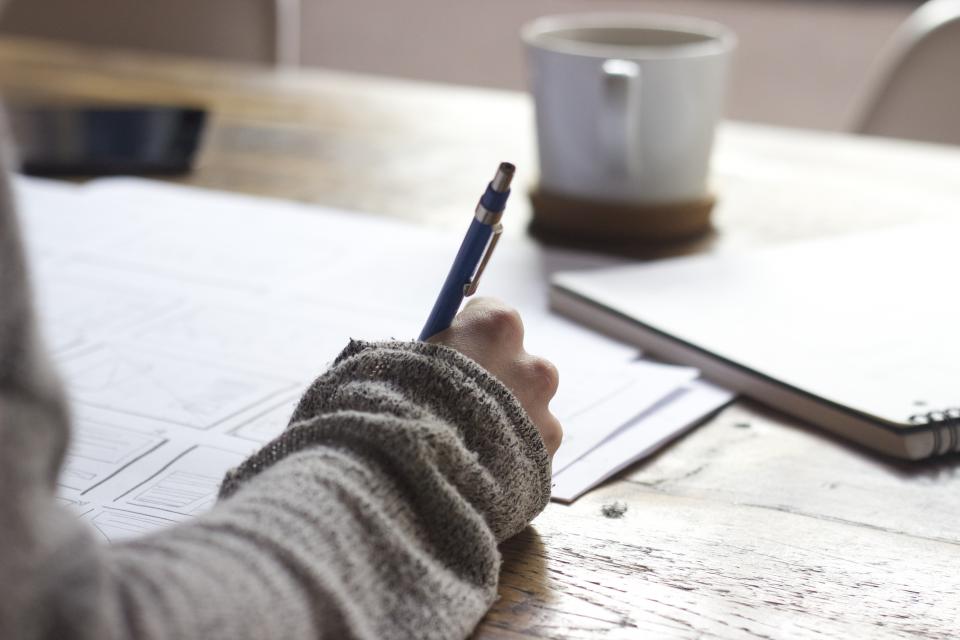 Hand writing in a notebook